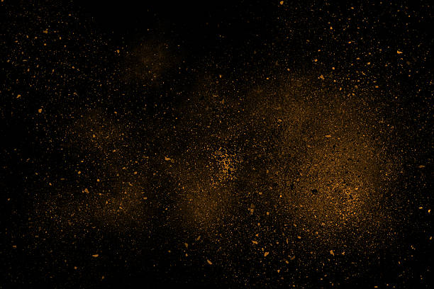 istock Orange abstract powder explosion on a black background 543581514
