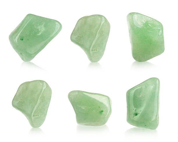 Natural  jade green mineral gem stone beads Natural  jade green mineral gem stone beads  isolated on white background. This has clipping path. jade gemstone stock pictures, royalty-free photos & images