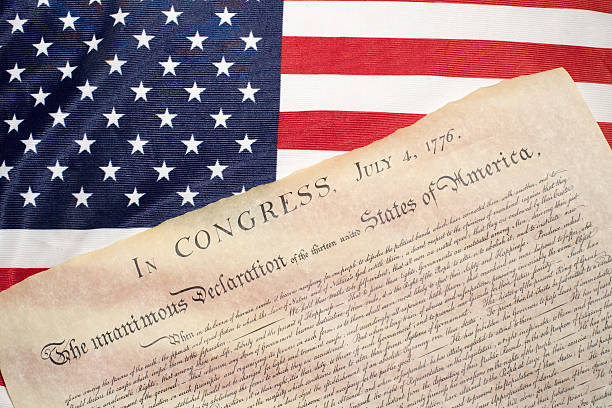 istock Declaration of independence 4th july 1776 on usa flag 543582590