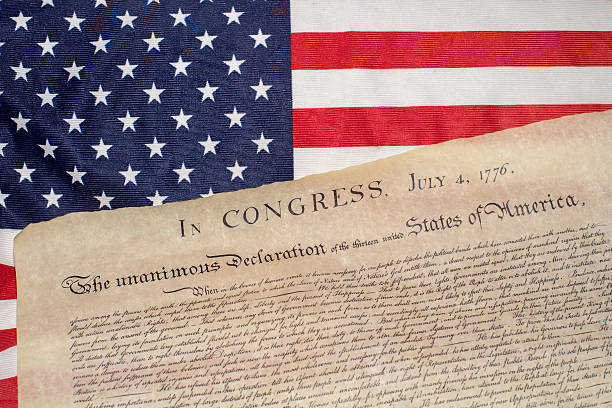 istock Declaration of independence 4th july 1776 on usa flag 543582656