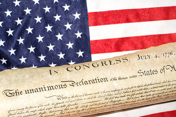 istock Declaration of independence 4th july 1776 on usa flag 543582702