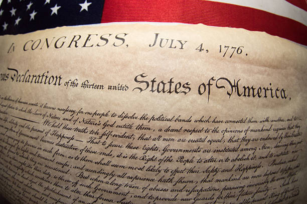 istock Declaration of independence 4th july 1776 on usa flag 543582724