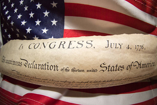 istock Declaration of independence 4th july 1776 on usa flag 543582790
