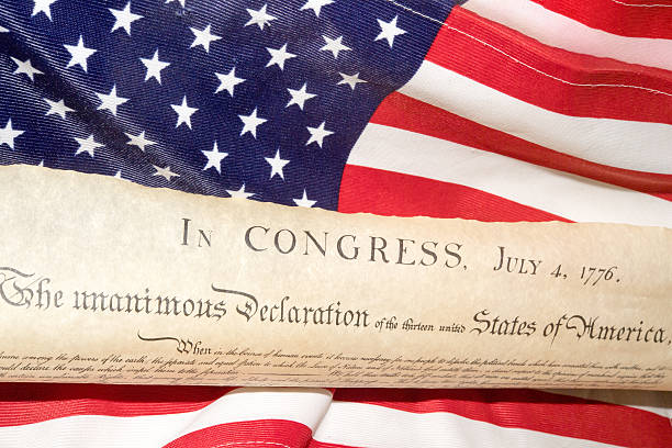 istock Declaration of independence 4th july 1776 on usa flag 543582862