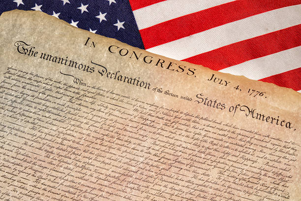istock Declaration of independence 4th july 1776 on usa flag 543582918