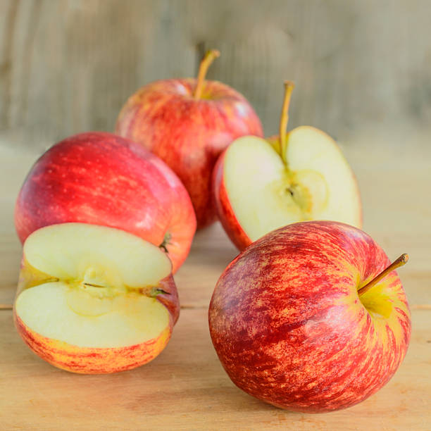 istock Red Apples on a wooden background. 543585490