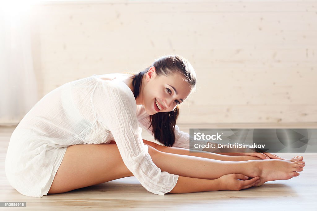 the girl is engaged in gymnastics and fitness Active Lifestyle Stock Photo