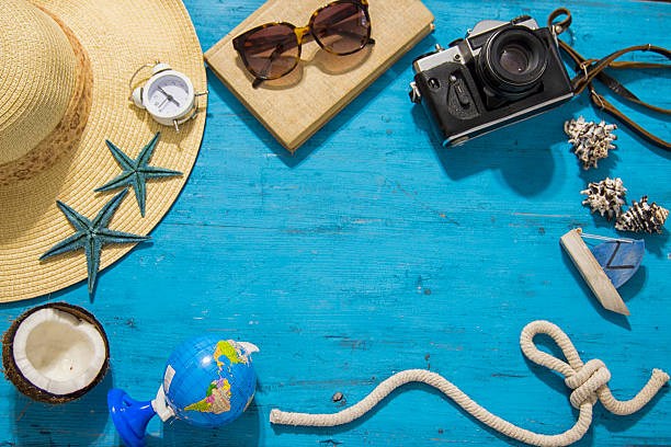 istock beach accessories on wooden board 543590308