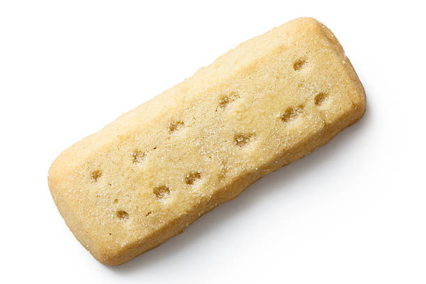 istock Traditional shortbread finger biscuit isolated on white. 543591836