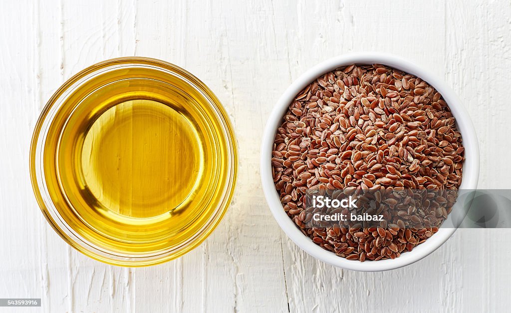 Aceite de linaza y semillas de lino - Foto de stock de Aceite para cocinar libre de derechos