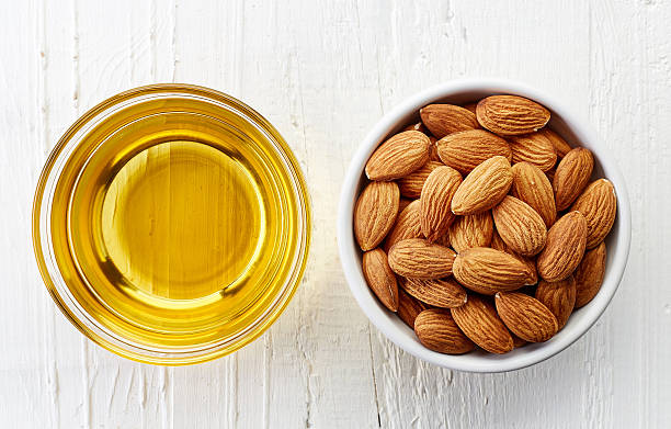 istock Almond oil and almonds 543593964
