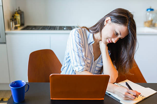 istock Woman working at home 543595436