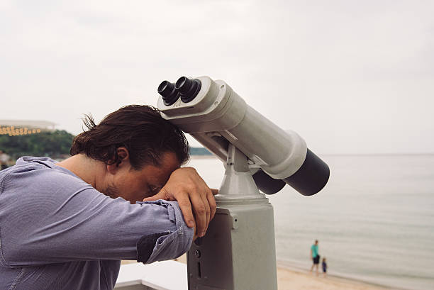 Tired, sleeping man stock photo