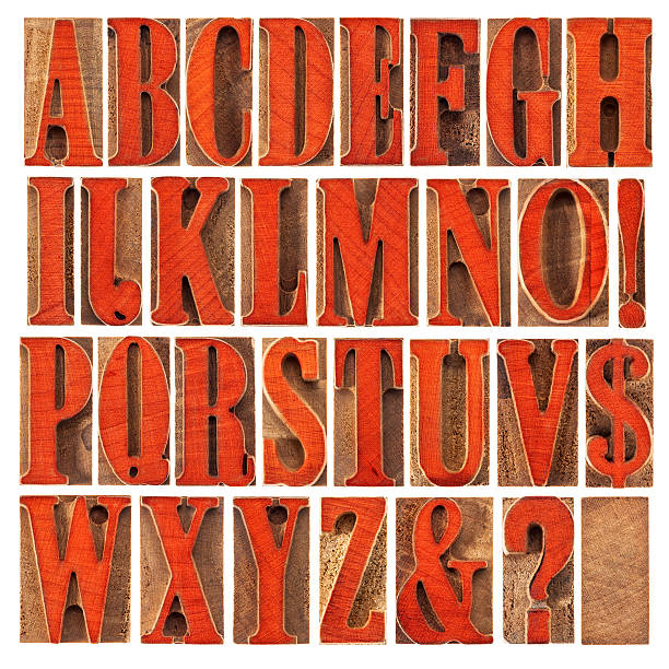 istock wood type alphabet stained by red 543598304