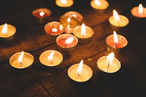 istock Group of lit candles in the night 543655216