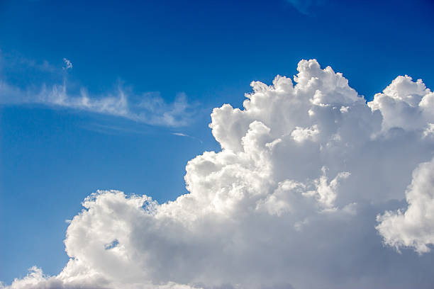 istock Blue sky with a lot of white puffy clouds 543655290