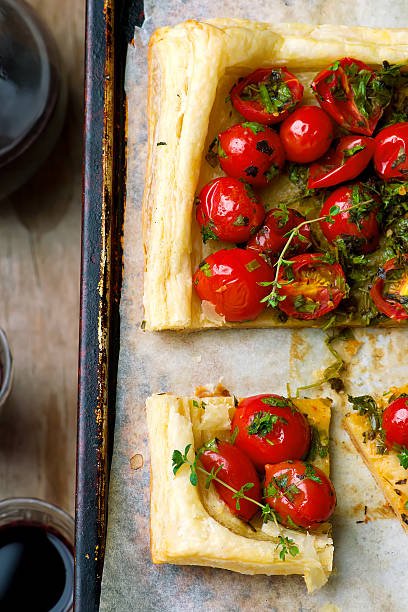 istock tart with cherry tomatoes and herbs 543657918