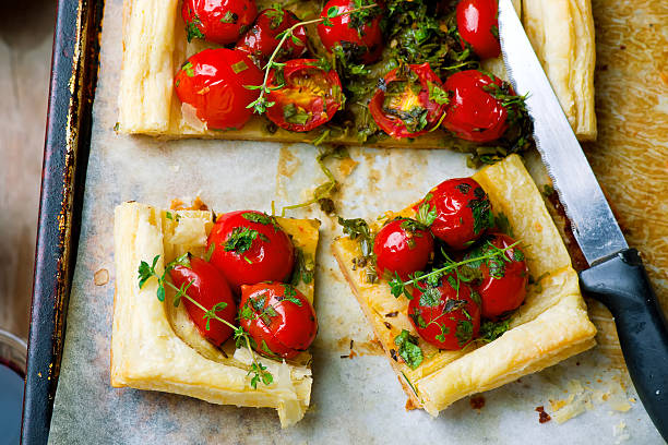 istock tart with cherry tomatoes and herbs 543657940