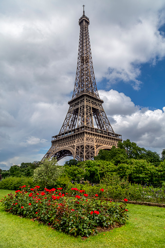 Mid-air side view of Eiffel tower in Paris, France.
