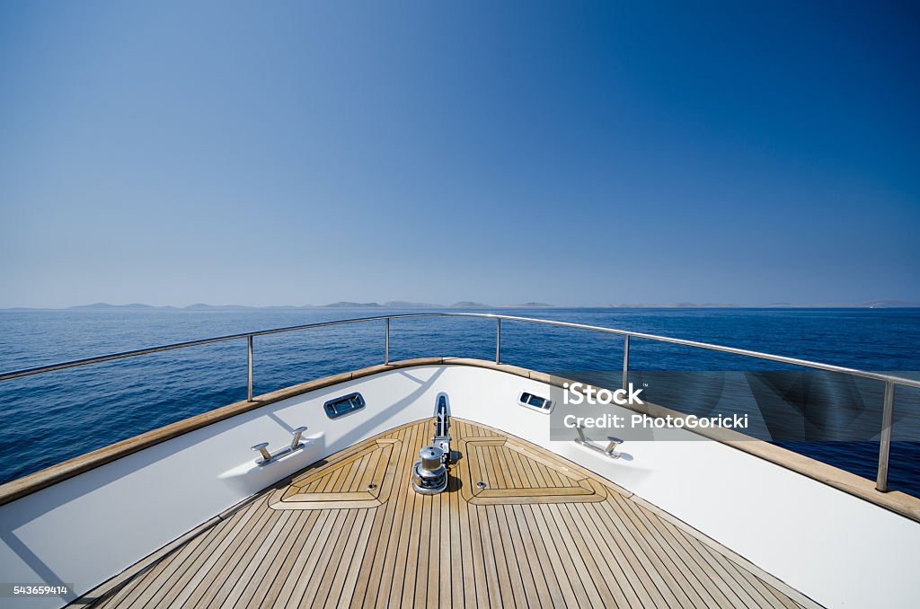 Wide angle shot of front of the yacht Wide angle shot of front of the yacht in summer time Ship's Bow Stock Photo