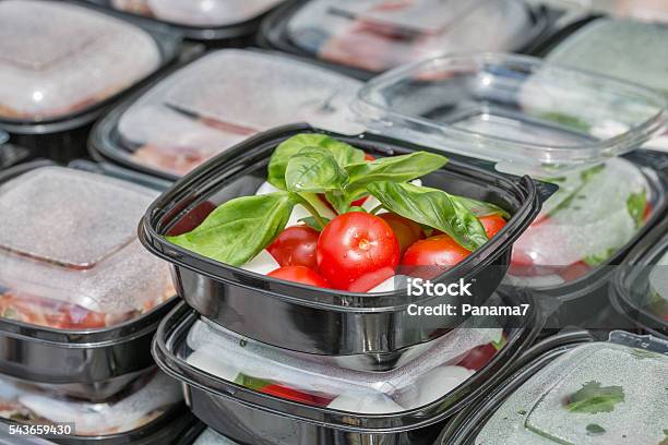 Street Food Box With Mozzarella Cheese Cherry Tomatoes And Basil Stock Photo - Download Image Now