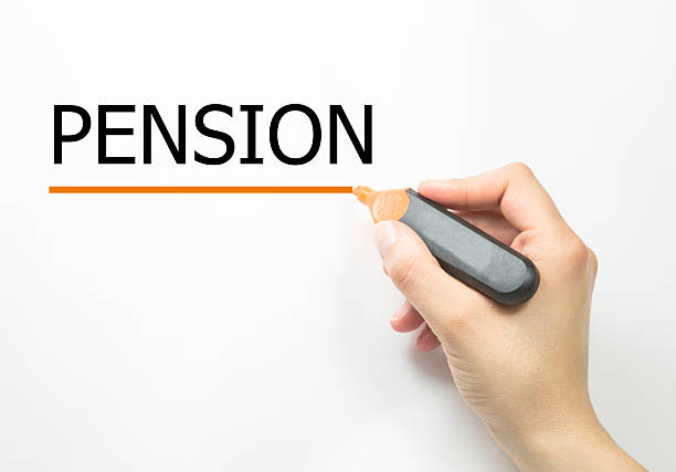 istock Hand writing pension with marker on transparent wipe board 543660712