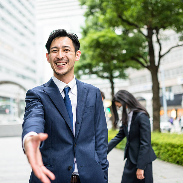 実業家は、大阪での握手 - osaka prefecture japanese culture japanese ethnicity japan ストックフォトと画像