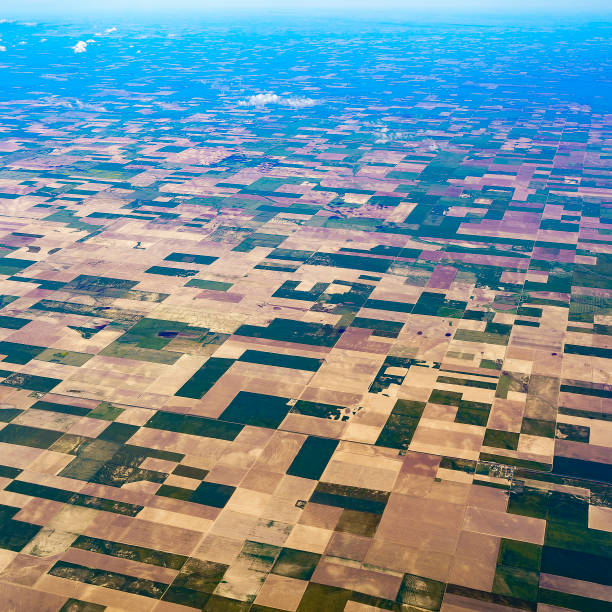 istock Aerial view to patchwork's fields in middle Kansas, USA 543662658