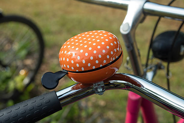 istock Detail of an orange bicycle ring bell 543664242