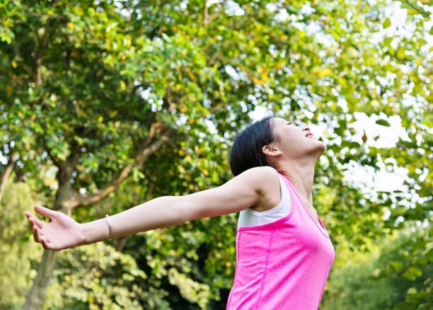 istock Young woman enjoying nature 543671028