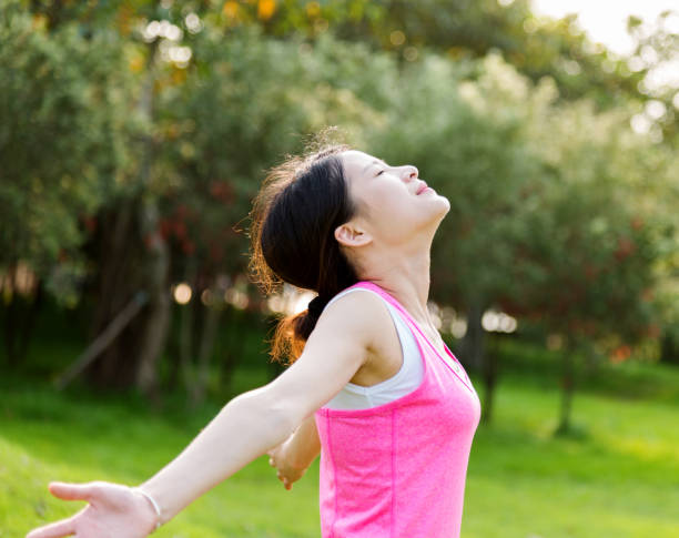 istock Young woman enjoying nature 543671074