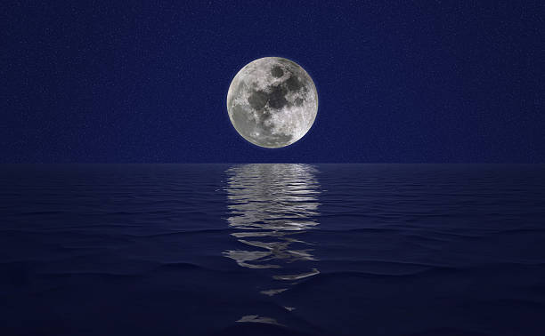 istock illustration with full moon over night water. 543672844