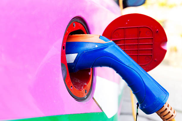 istock blue gas gun and pink car 543673094