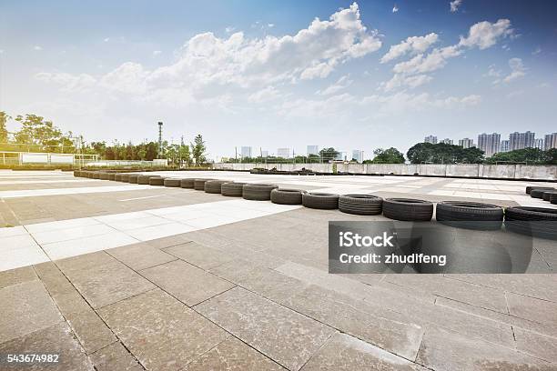 Go Cart Track Skyline And Modern Buildings Stock Photo - Download Image Now - Car, Concrete, Sports Race