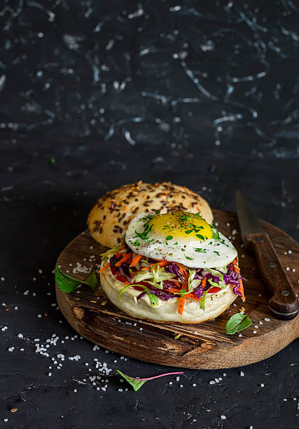 istock Homemade burger with fried egg and coleslaw 543675336