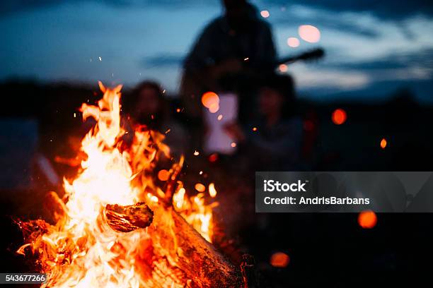 Bonfire With Sparks Flying Around Stock Photo - Download Image Now - Bonfire, Campfire, Beach