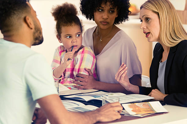istock Female insurance agent with familly 543679990
