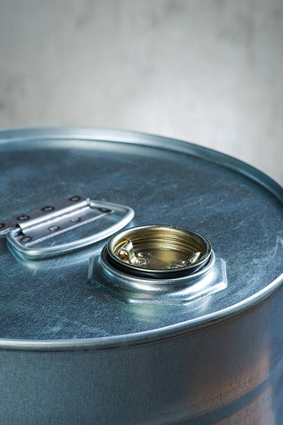 istock Chemicals drum over the concrete wall background 543680422