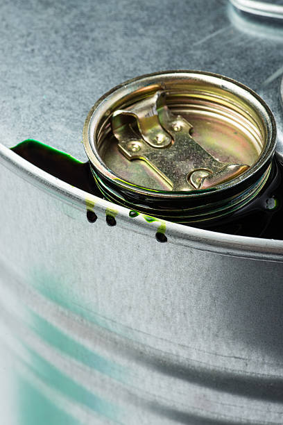 istock Steel chemicals drum with pollution liquid over the white background 543685062