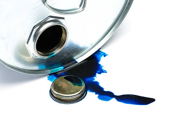 istock Steel chemicals drum with pollution liquid over the white background 543685808