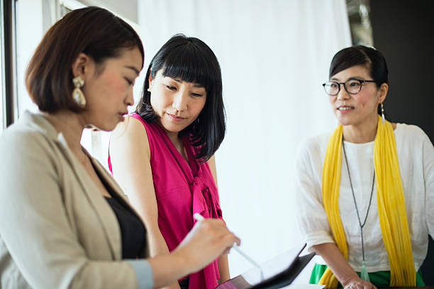 istock Team of interior designers discussing in the studio 543689570