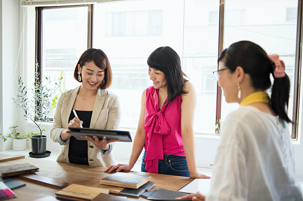 istock Team of interior designers discussing in the studio 543690006
