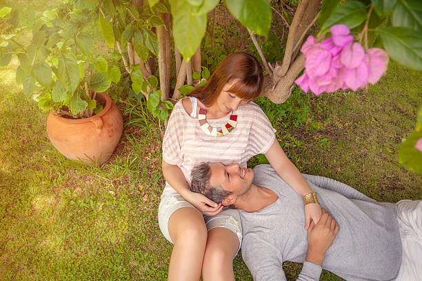 girlfriend teasing boyfriend stock photo