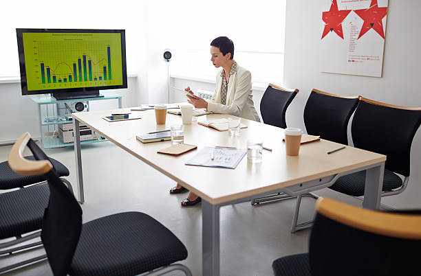 istock Female leader in board room 543691974