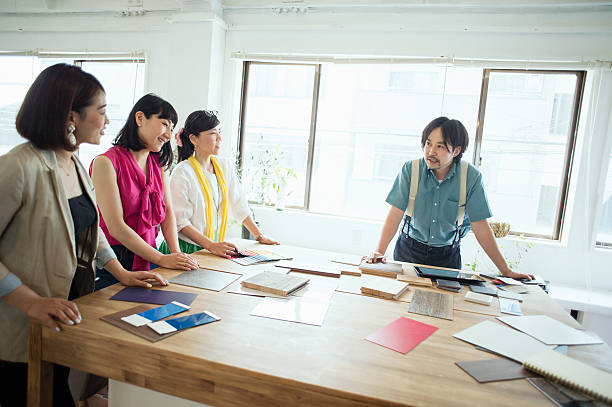 istock Team of interior designers discussing in the studio 543692790