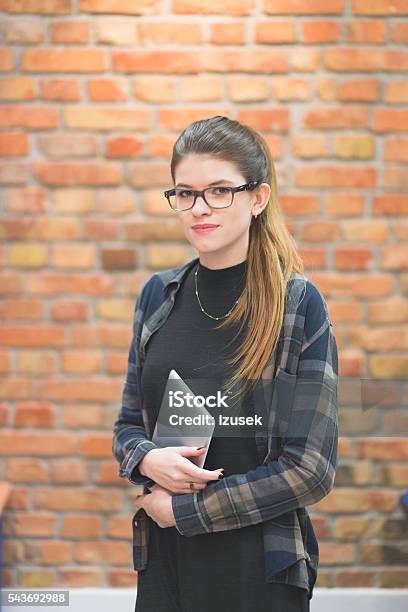 Friendly Female Student At School Smiling At Camera Stock Photo - Download Image Now