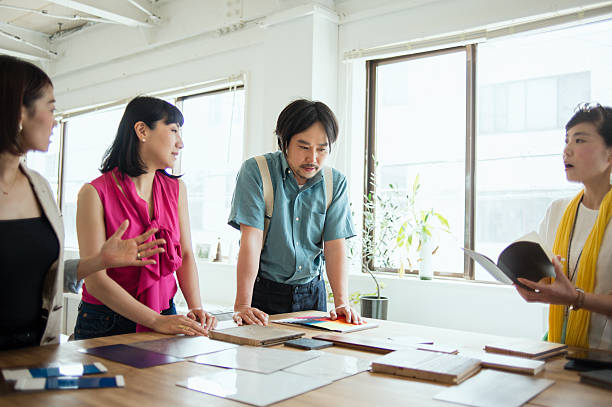 istock Team of interior designers discussing in the studio 543693100