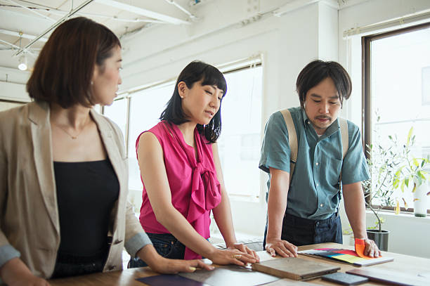istock Team of interior designers discussing in the studio 543693180