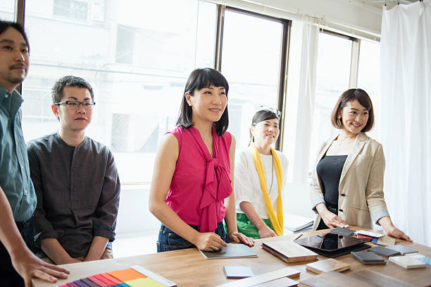 istock Team of interior designers discussing in the studio 543694084
