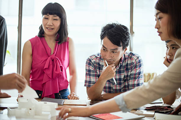 istock Team of interior designers discussing in the studio 543694212
